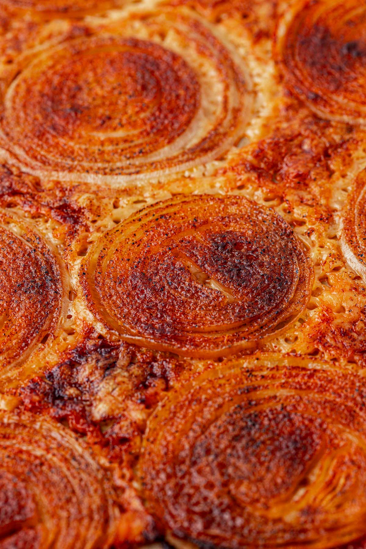 Onion ring chips on a pan.