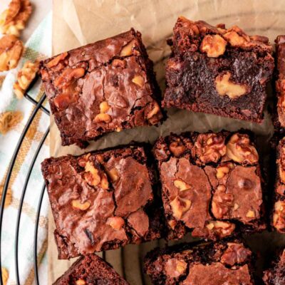 Overhead photo of Walnut brownies slices on a wire rack.