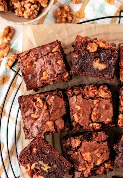 Overhead photo of Walnut brownies slices on a wire rack.